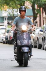 PAULINA PORIZKOVA Out Driving a Scooter in New York 08/12/2021