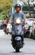 PAULINA PORIZKOVA Out Driving a Scooter in New York 08/12/2021