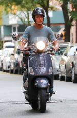 PAULINA PORIZKOVA Out Driving a Scooter in New York 08/12/2021