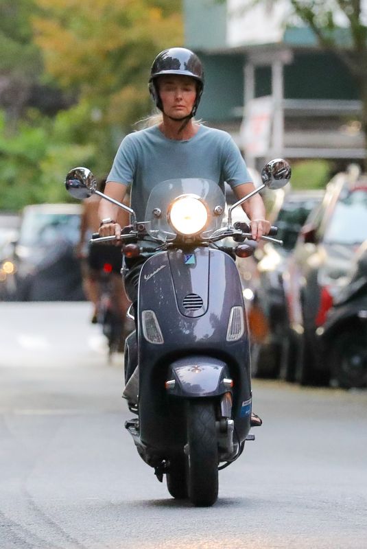 PAULINA PORIZKOVA Out Driving a Scooter in New York 08/12/2021