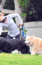 RENEE ZELLWEGER Out with Her Dogs at a Park in Laguna Beach 08/23/2021