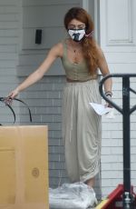 SARAH HYLAND Unpacks a Large Selivery at Her Home in Hollywood 08/18/2021