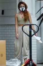 SARAH HYLAND Unpacks a Large Selivery at Her Home in Hollywood 08/18/2021
