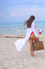TAO WICKRATH in a Red Bikini at a Beach in Miami 08/02/2021