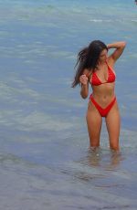 TAO WICKRATH in a Red Bikini at a Beach in Miami 08/02/2021