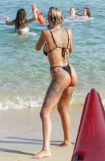 TINA LOUISE and AMANZA SMITH in Bikinis at a Beach in Mykonos 08/01/2021