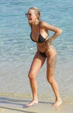 TINA LOUISE and AMANZA SMITH in Bikinis at a Beach in Mykonos 08/01/2021