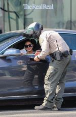 VANESSA HUDGENS Gets Ticket for Using Phone While Driving in West Hollywood 08/30/2021