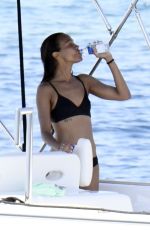 ZOE SALDANA in Bikini at a Boat in Italy 08/16/2021