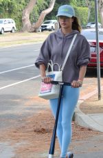 ALESSANDRA AMBROSIO Riding a Scooter Out in Brentwood 08/31/2021
