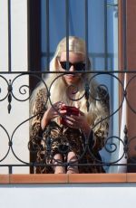 ANYA TAYLOR-JOY and Malcom McRae on Her Hotel Balcony in Venice 09/05/2021