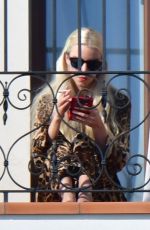 ANYA TAYLOR-JOY and Malcom McRae on Her Hotel Balcony in Venice 09/05/2021