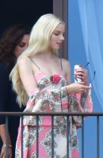 ANYA TAYLOR-JOY Enjoys a Cigarette on Her Hotel Balcony in Venice 09/04/2021