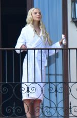 ANYA TAYLOR-JOY Enjoys a Cigarette on Her Hotel Balcony in Venice 09/04/2021
