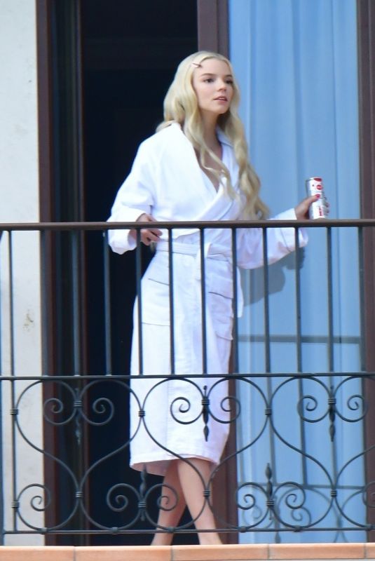 ANYA TAYLOR-JOY Enjoys a Cigarette on Her Hotel Balcony in Venice 09/04/2021