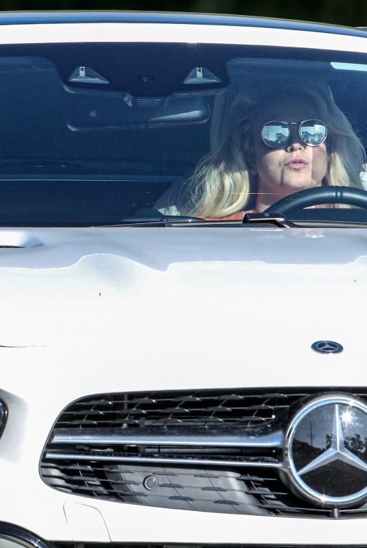 BRITNEY SPEARS Out Driving Her Mercedes-AMG SL 63 in Calabasas 09/01/2021