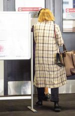 ELIZABETH OLSEN at LAX Airport in Los Angeles 09/20/2021
