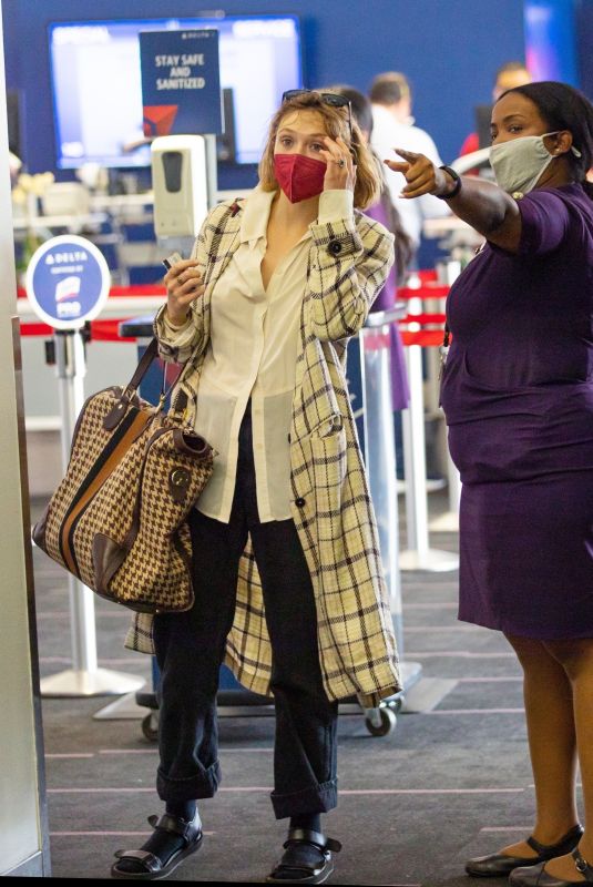 ELIZABETH OLSEN at LAX Airport in Los Angeles 09/20/2021