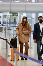 GIGI HADID Arrives at Charles de Gaulle Airport in Paris 09/27/2021