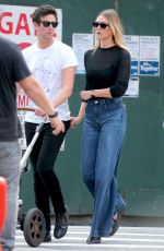 KARLIE KLOSS and Joshua Kushner Out with Their Baby at Washington Square Park in New York 09/11/2021
