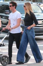 KARLIE KLOSS and Joshua Kushner Out with Their Baby at Washington Square Park in New York 09/11/2021