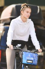 KATE BOCK Rides a Citi Bike Out in New York 09/20/2021