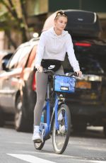 KATE BOCK Rides a Citi Bike Out in New York 09/20/2021