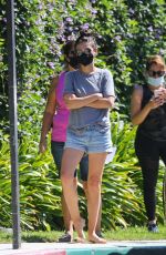 MILA KUNIS Arrives at Her Kid