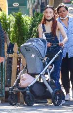SOPHIE TURNER and Joe Jonas Out with Their Baby in New York 09/25/2021