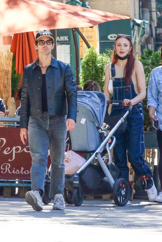 SOPHIE TURNER and Joe Jonas Out with Their Baby in New York 09/25/2021
