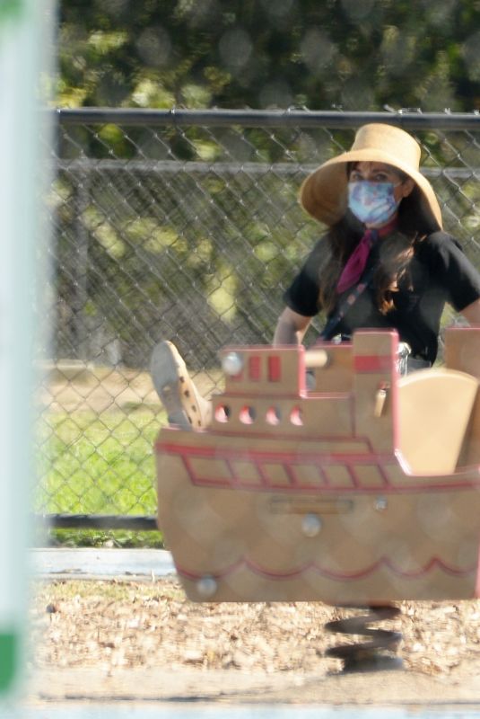 ZOOEY DESCHANEL Out at a Park in Santa Monica 09/05/2021