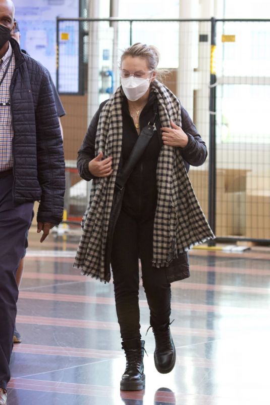 ALYSSA MILANO at Reagan International Airport in Washington D.C. 10/19/2021