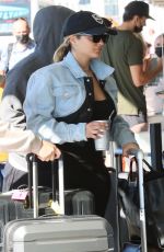BEBE REXHA Arrives at LAX Airport in Los Angeles 10/05/2021