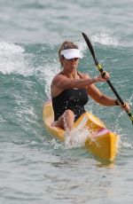 CANDICE WARNER in Swimsuit Workout at a Beach in Sydney 10/28/2021