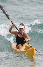 CANDICE WARNER in Swimsuit Workout at a Beach in Sydney 10/28/2021