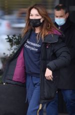 CARLA BRUNI Out and About in Warsaw 10/28/2021
