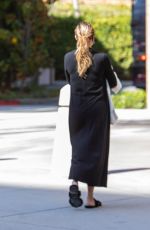 CHRISSY TEIGEN Arrives at an Office Building in Beverly Hills 09/30/2021