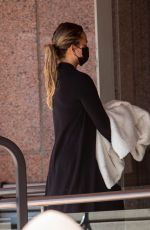 CHRISSY TEIGEN Arrives at an Office Building in Beverly Hills 09/30/2021