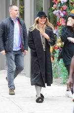 CHRISSY TEIGEN Out with a Friend in New York 10/26/2021