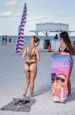 CLAUDIA ROMANI and CLOE GRECO in Bikinis at a Beach in Miami 10/19/2021