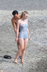 DAKOTA FANNING in a Retro Swimsuit on the Set of Ripley on Amalfi Coast 10/20/2021