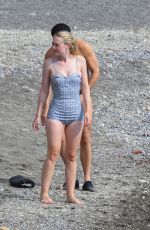 DAKOTA FANNING in a Retro Swimsuit on the Set of Ripley on Amalfi Coast 10/20/2021