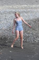 DAKOTA FANNING in a Retro Swimsuit on the Set of Ripley on Amalfi Coast 10/20/2021
