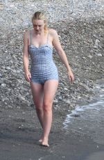 DAKOTA FANNING in a Retro Swimsuit on the Set of Ripley on Amalfi Coast 10/20/2021