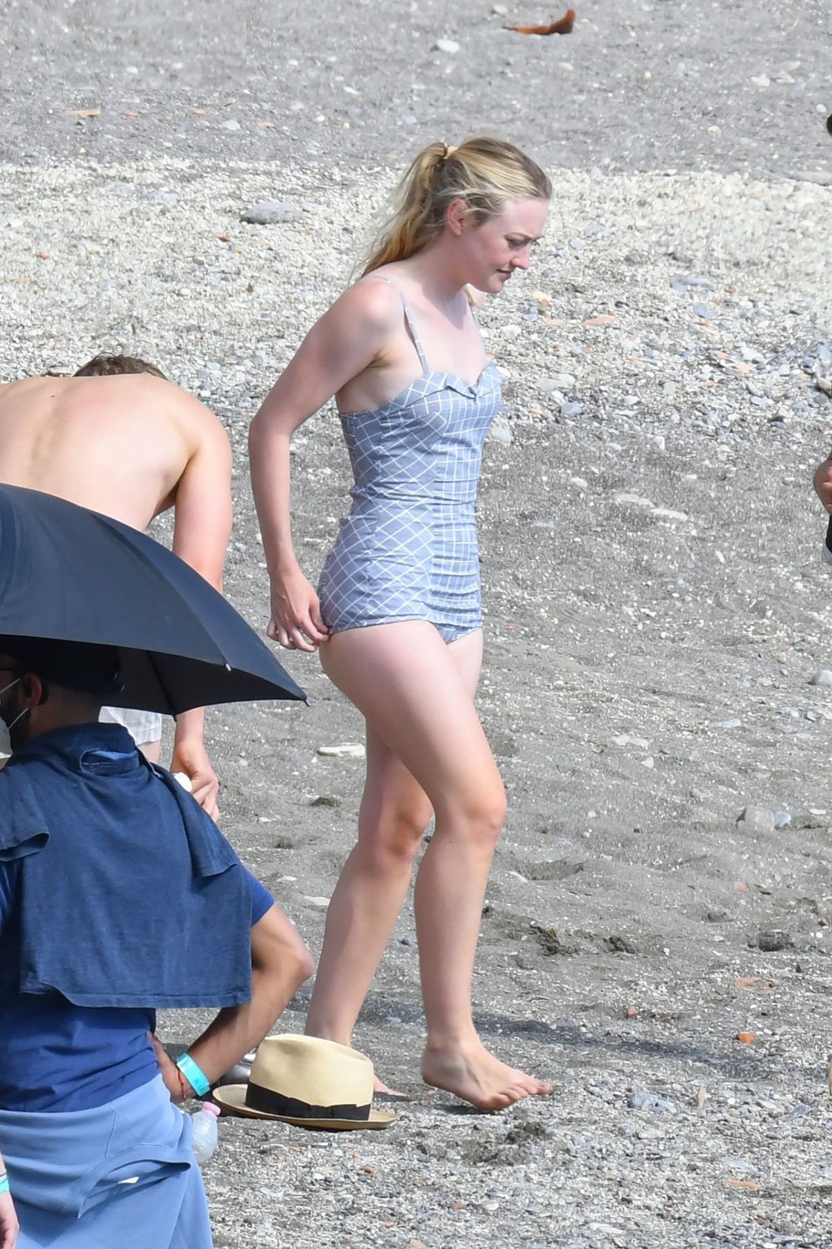 DAKOTA FANNING in a Retro Swimsuit on the Set of Ripley on Amalfi Coast 10/...