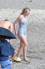 DAKOTA FANNING in a Retro Swimsuit on the Set of Ripley on Amalfi Coast 10/20/2021