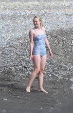 DAKOTA FANNING in a Retro Swimsuit on the Set of Ripley on Amalfi Coast 10/20/2021