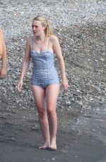DAKOTA FANNING in a Retro Swimsuit on the Set of Ripley on Amalfi Coast 10/20/2021