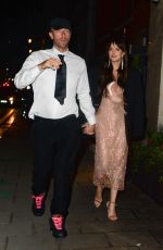 DAKOTA JOHNSON and Chris Martin at Claridges Hotel in London 10/13/2021