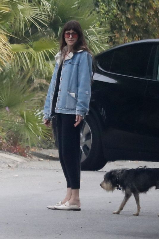 DAKOTA JOHNSON Out with Her Dog in Malibu 10/30/2021